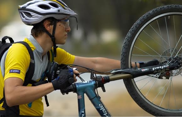 ciclista con bici